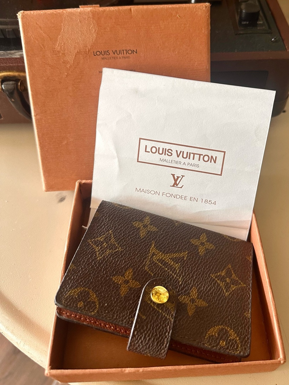 Louis Vuitton Brown Monogram Snap Wallet with Gold-Tone Button